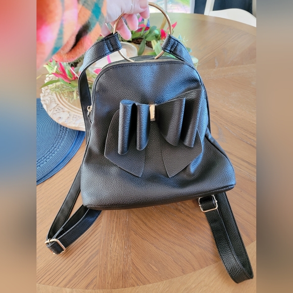 Grossi Bags Black Leather Grossi Backpack Purse 2x1x5 Inches Fast